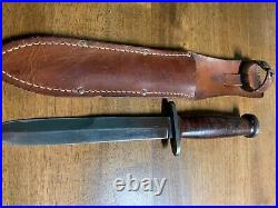 WW2 case M3 trench knife straight guard smooth handle. Original scabbard. Rare