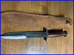 WW2 case M3 trench knife straight guard smooth handle. Original scabbard. Rare